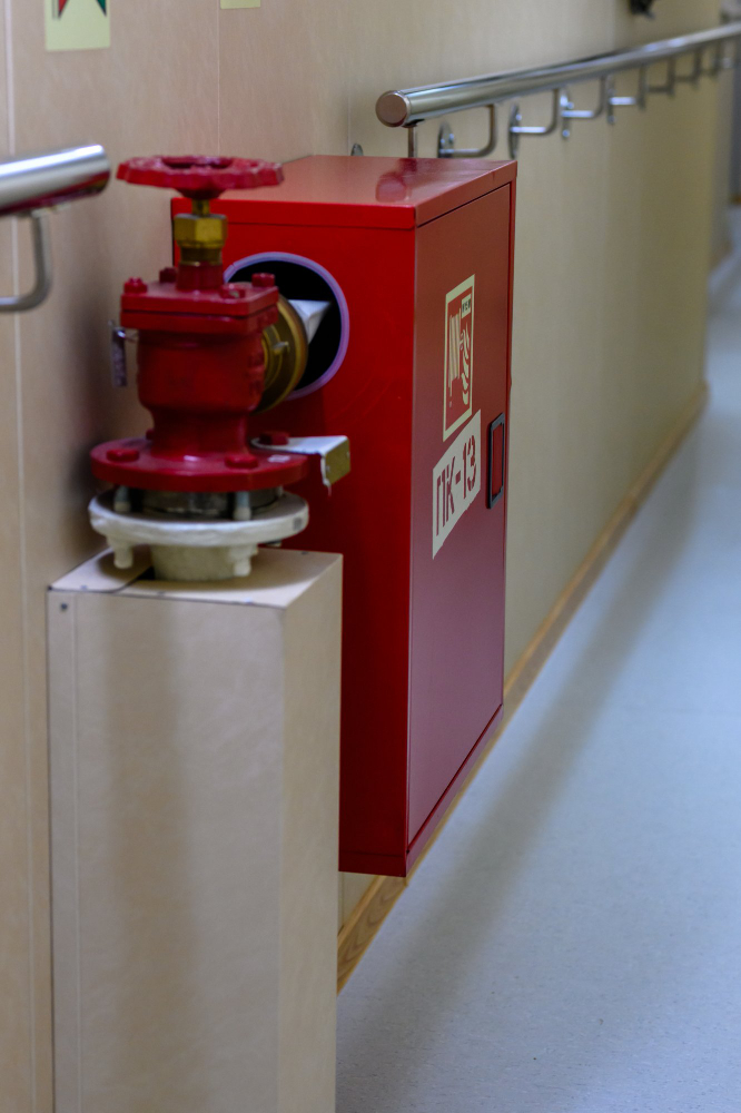 Fire hydrant valve and hose reel cabinet in a commercial building
